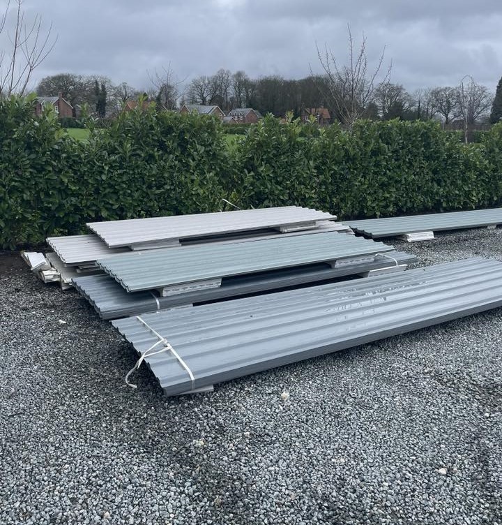 Cloudy Blue roofing sheets on a domestic or agricultural building.
