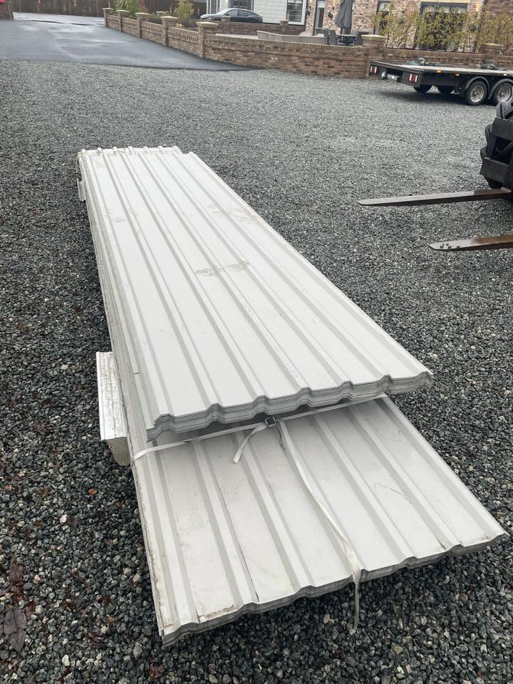 Green White roofing sheets offering a bright, clean aesthetic.